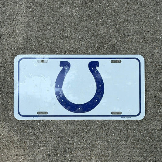 Photo of a 1990 Era Indianapolis Colts Indiana Booster License Plate Auto Tag Garage Decor Vintage
 Horseshoe Sports Football Metal with original patina