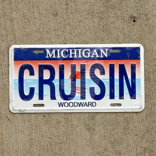 Photo of a 1990 Era Michigan Booster License Plate Auto Tag Garage Decor Vintage
 Woodward Avenue NOS Metal CRUISIN with original patina