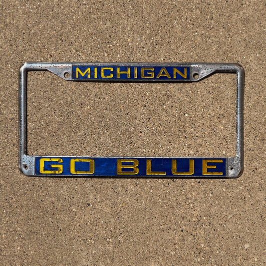 Photo of a 1990 Era Michigan Frame Auto Tag Garage Decor Vintage University Michigan GO BLUE