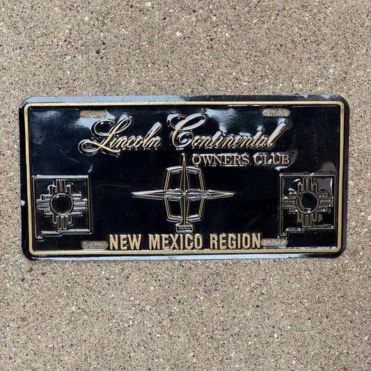 Photo of a 1990 Era New Mexico Booster License Plate Auto Tag Garage Decor Vintage Antique Vehicle Classic Car Lincoln Continental Owners Club