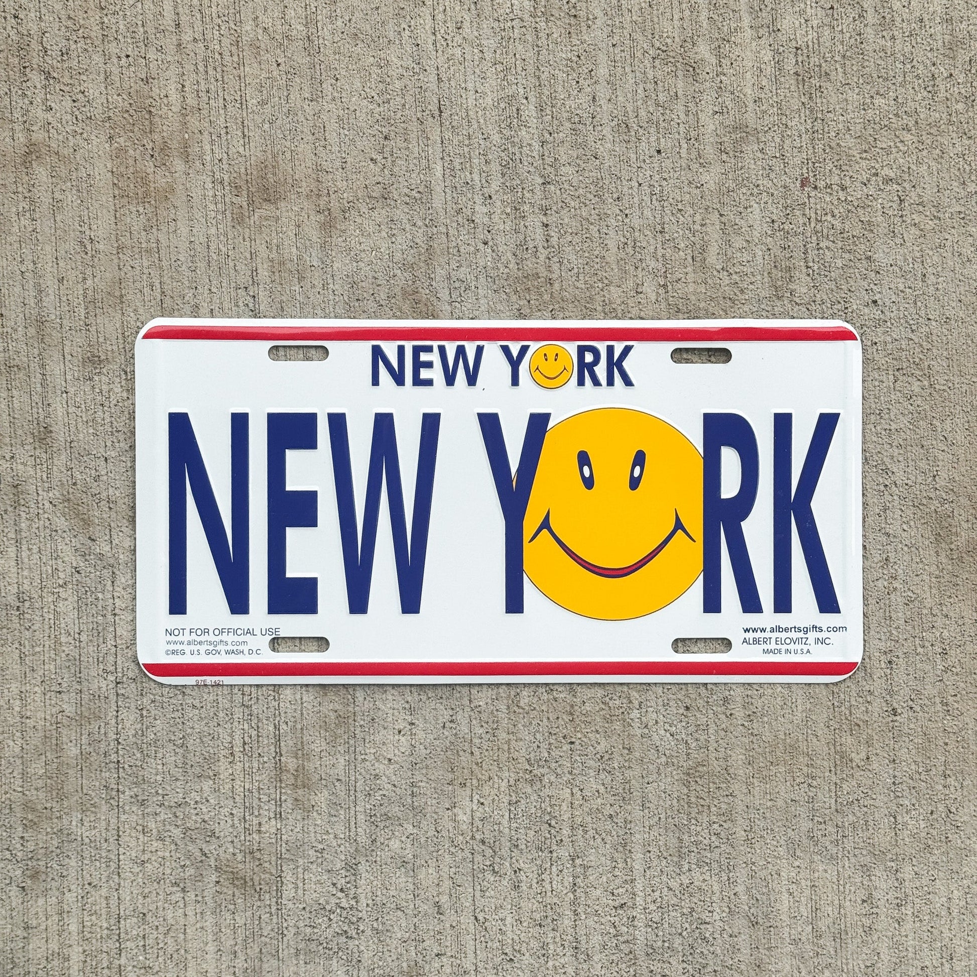 Photo of a 1990 Era New York License Plate Booster License Plate Auto Tag Garage Decor Vintage Smiley Face New York with original patina