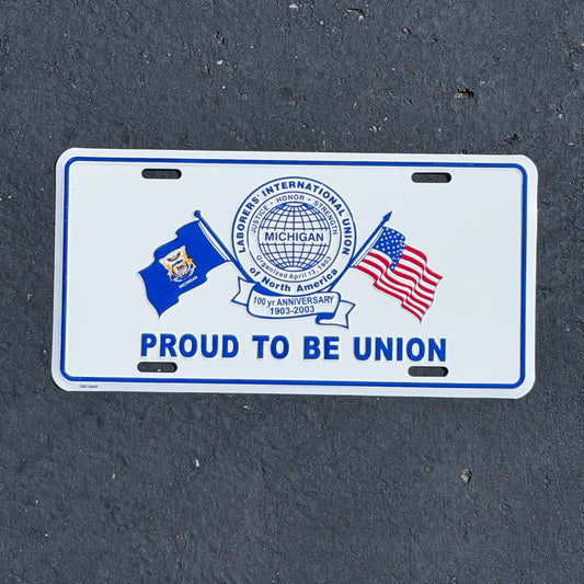 Photo of a 1990 Era Proud to be Union Laborer's International Union Michigan Booster License Plate Auto Tag Garage Decor Vintage
 Union Metal with original patina