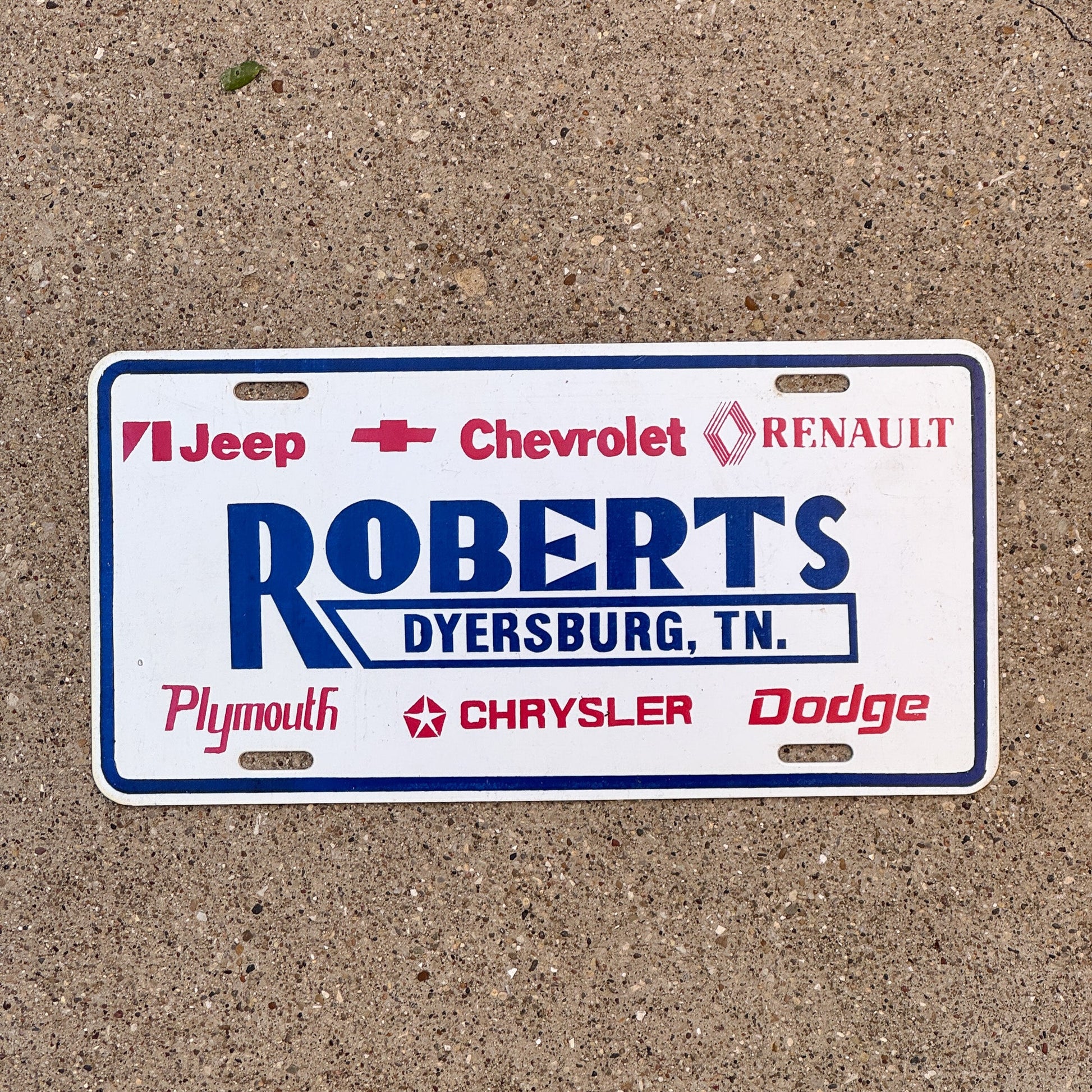 Photo of a 1990 Era Tennessee Dealer Booster License Plate Auto Tag 1 Garage Decor Dyersburg TN Plastic ROBERTS with original patina