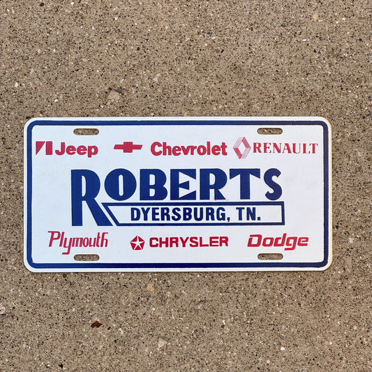 Photo of a 1990 Era Tennessee Dealer Booster License Plate Auto Tag 2 Garage Decor Dyersburg TN Plastic ROBERTS with original patina