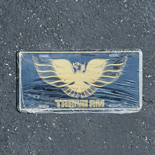 Photo of a 1990 Era Trans AM Booster License Plate Auto Tag 3 Vintage
 Firebird Classic Car NOS Metal with original patina