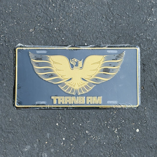 Photo of a 1990 Era Trans AM Booster License Plate Auto Tag 5 Vintage
 Firebird Classic Car NOS Metal with original patina