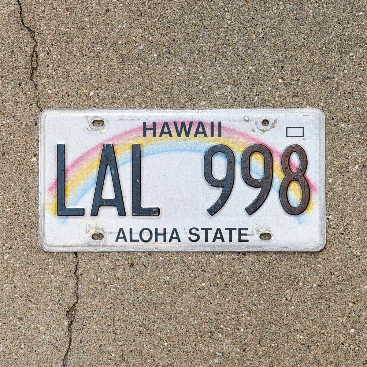 Photo of a 1990 Hawaii License Plate Auto Tag Garage Decor Vintage Rainbow LAL 998 with original patina