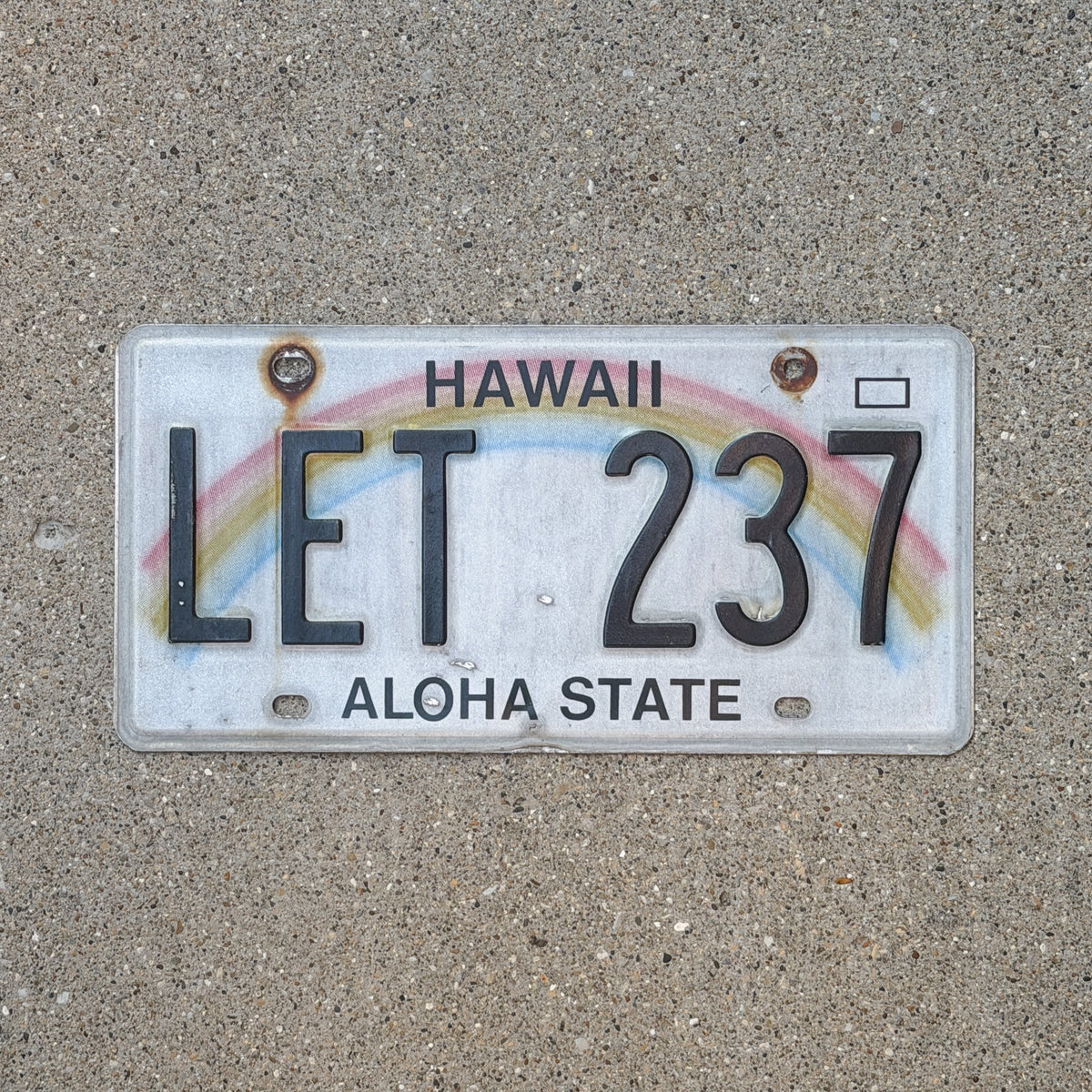 Photo of a 1990 Hawaii License Plate Auto Tag Garage Decor Vintage Rainbow LET 237 with original patina