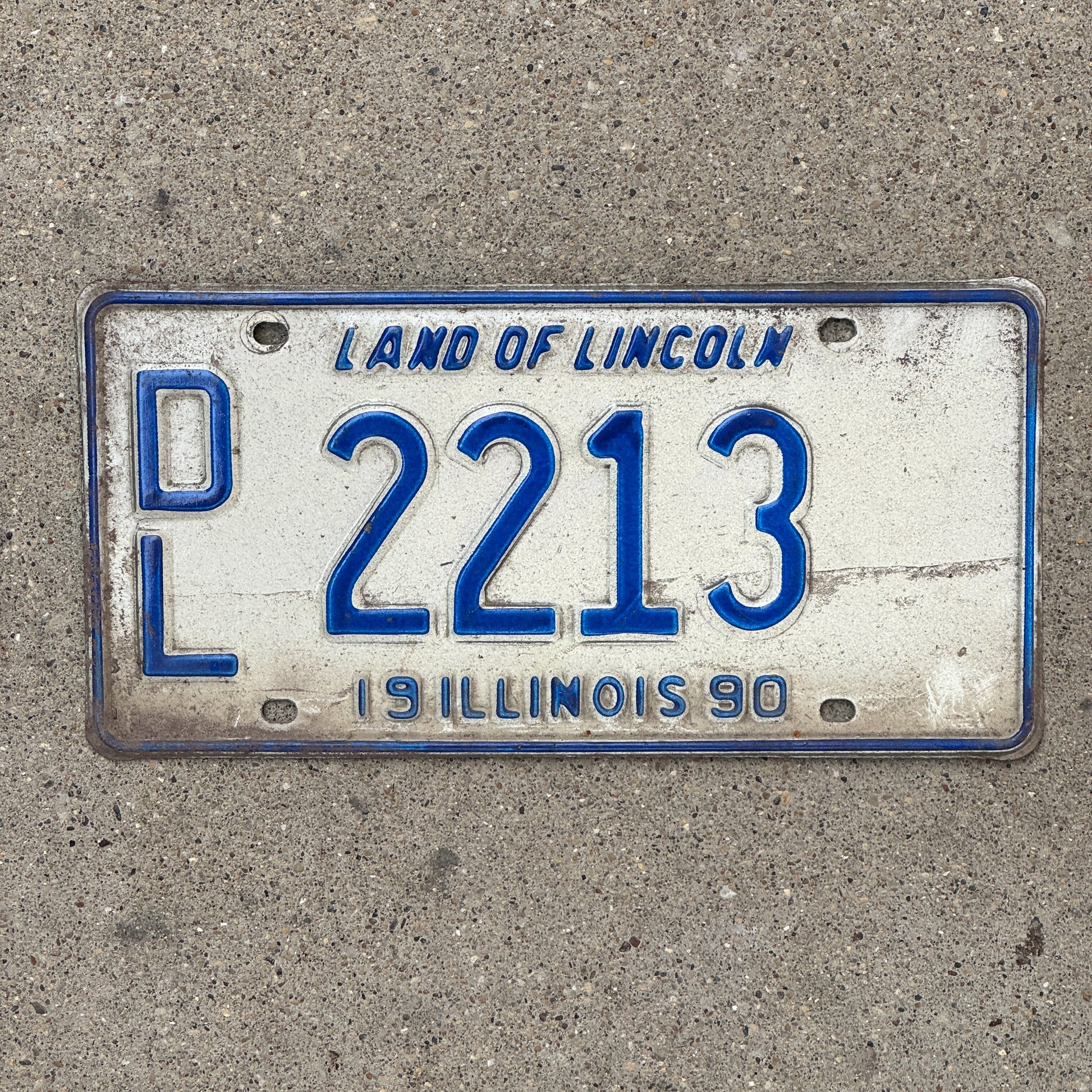 Photo of a 1990 Illinois Dealer License Plate Auto Tag 1 Vintage Garage 2213 with original patina
