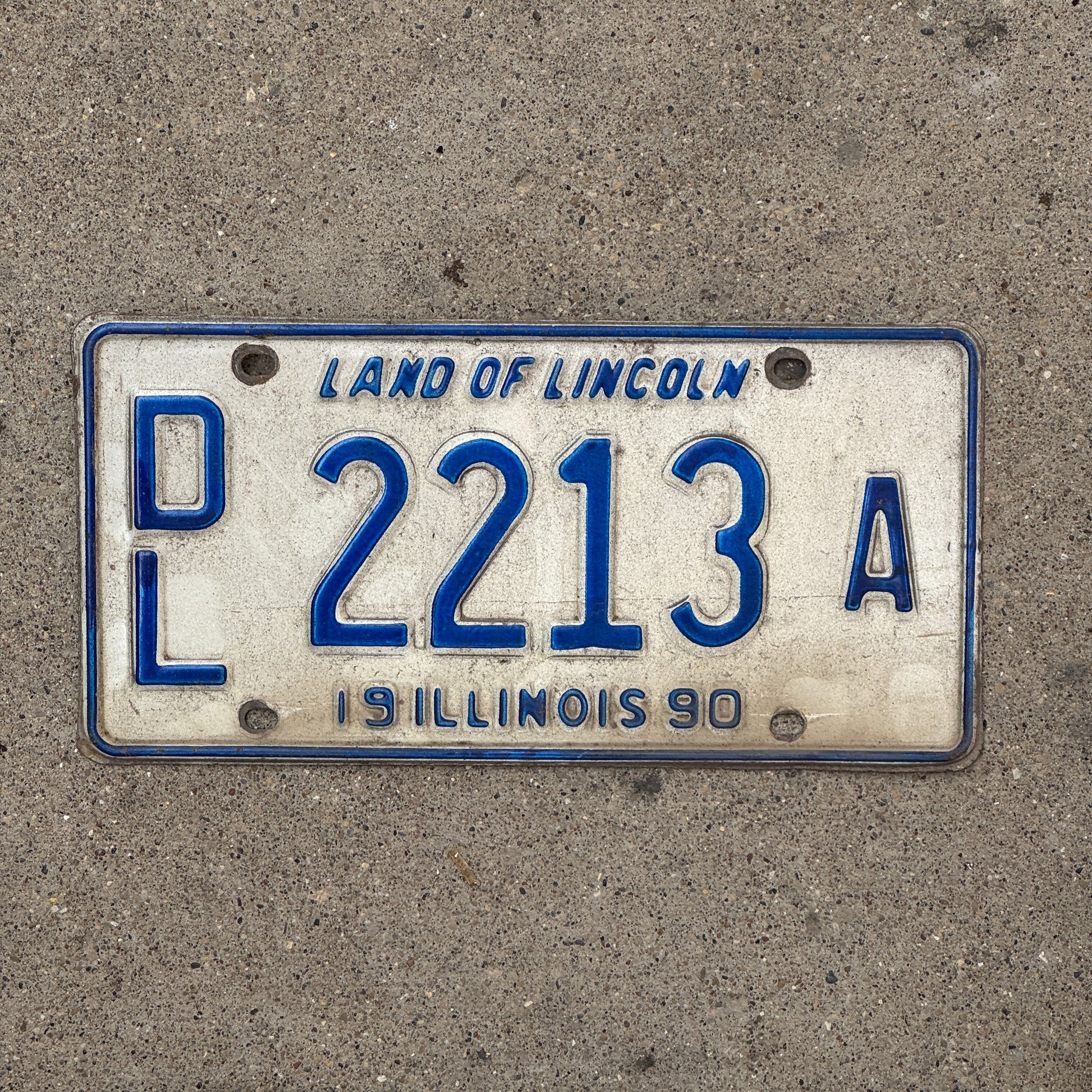 Photo of a 1990 Illinois Dealer License Plate Auto Tag 1 Vintage Garage 2213 A with original patina