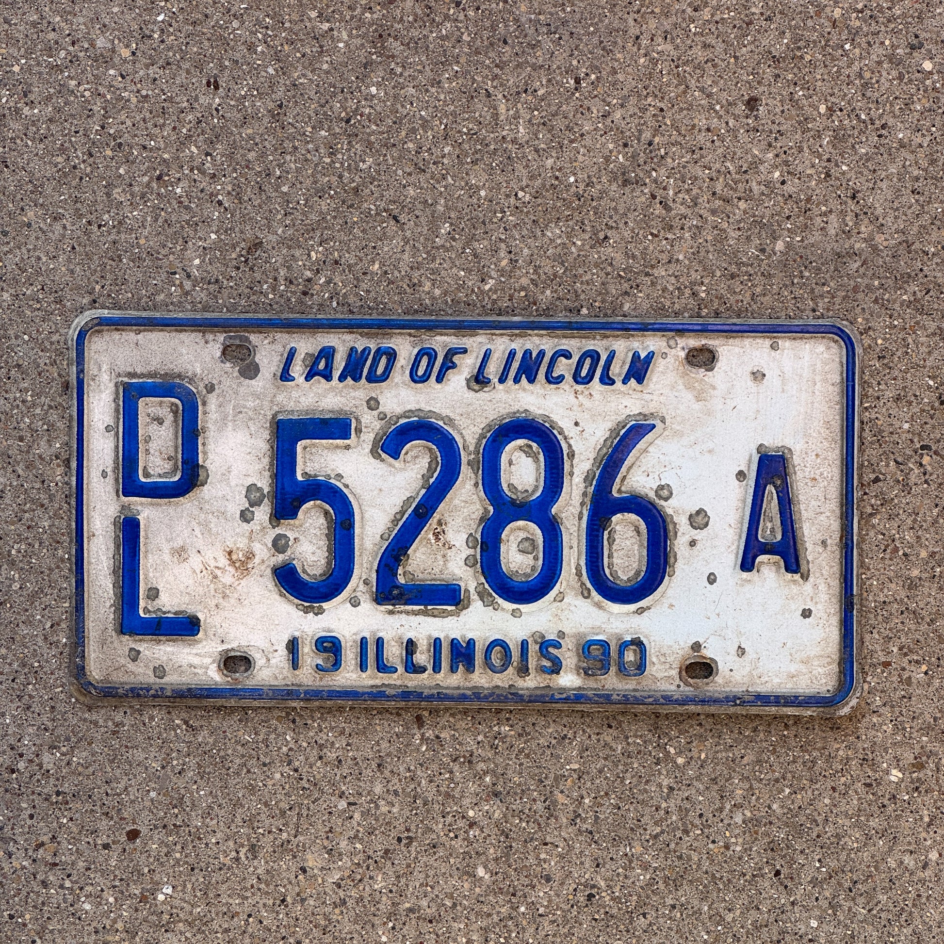 Photo of a 1990 Illinois Dealer License Plate Auto Tag 1 Vintage Garage 5286 A with original patina