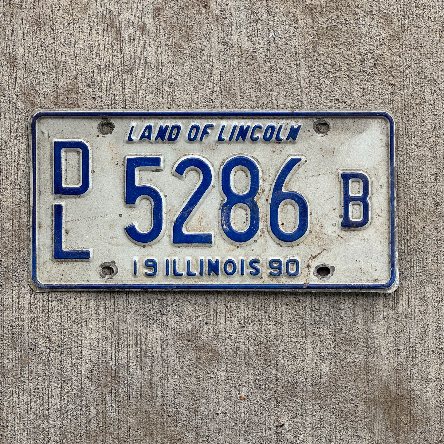 Photo of a 1990 Illinois Dealer License Plate Auto Tag 1 Vintage Garage 5286 B with original patina