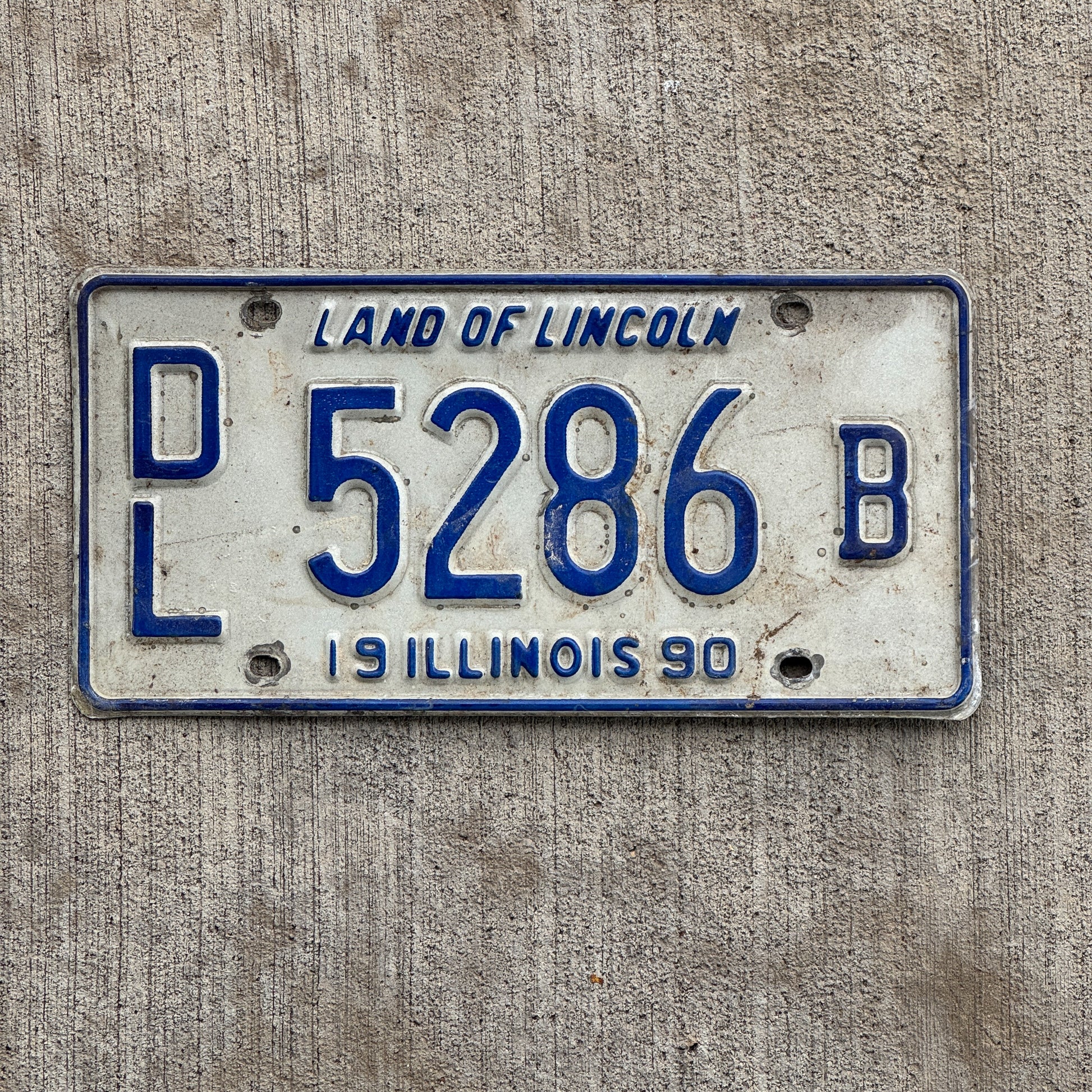 Photo of a 1990 Illinois Dealer License Plate Auto Tag 1 Vintage Garage 5286 B with original patina