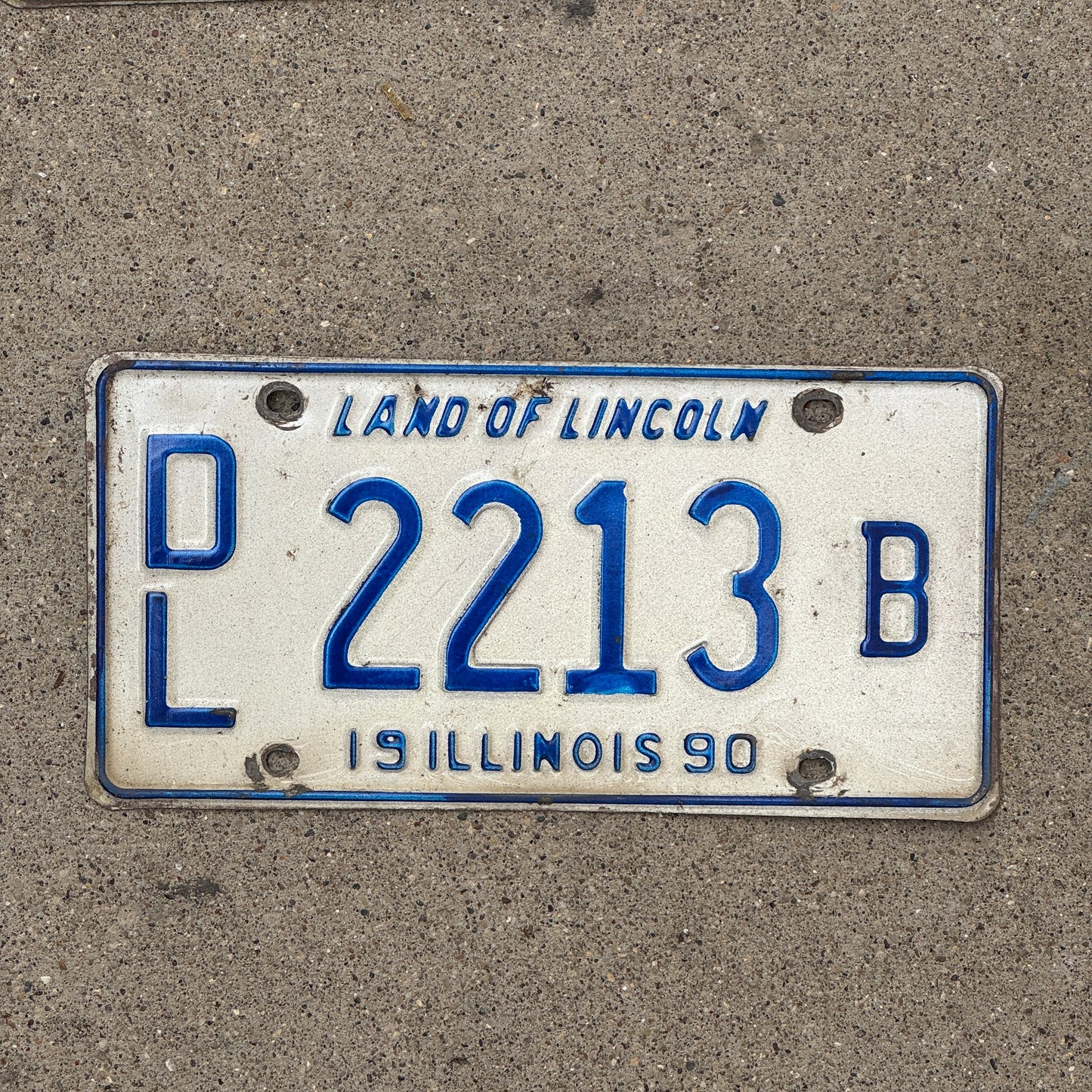Photo of a 1990 Illinois Dealer License Plate Auto Tag 2 Vintage Garage 2213 B with original patina