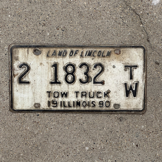Photo of a 1990 Illinois Tow Truck License Plate Auto Tag 2 Vintage Garage 2 1832 TW with original patina