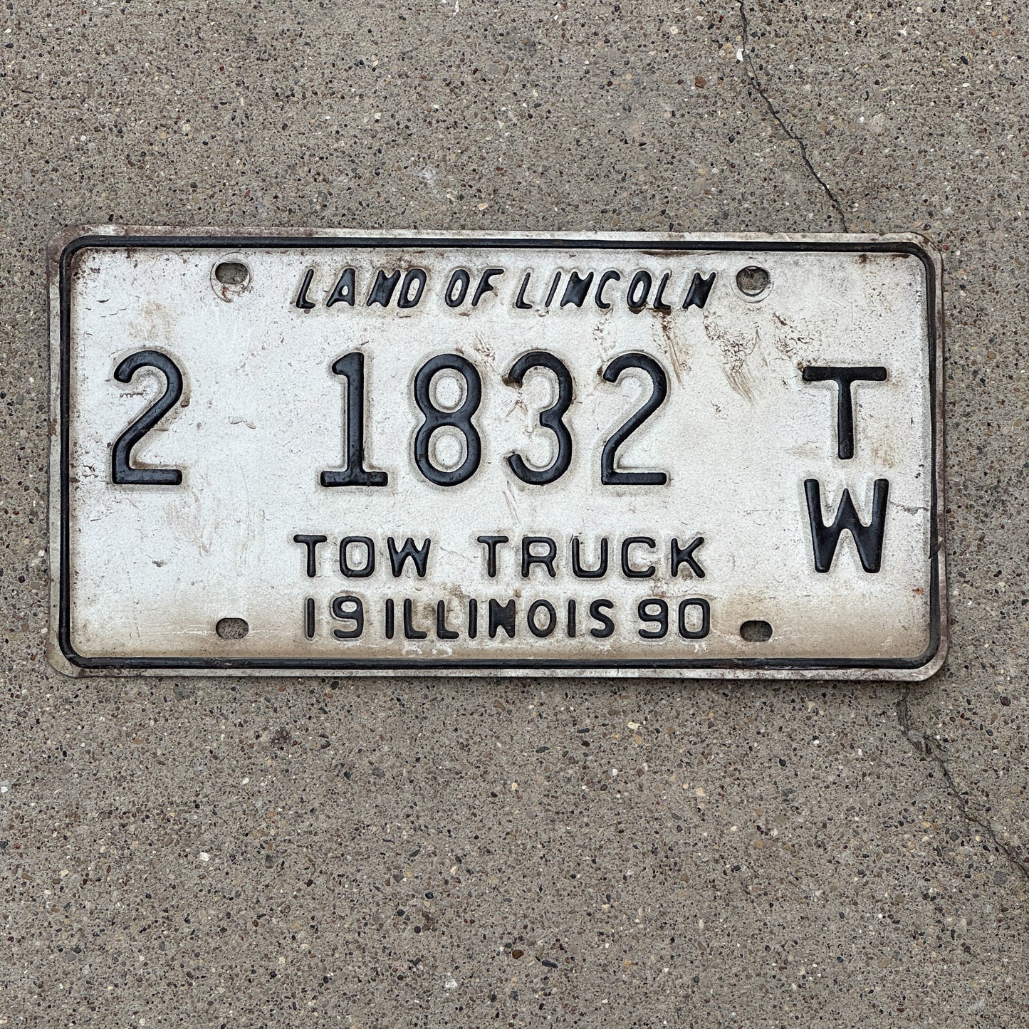 Photo of a 1990 Illinois Tow Truck License Plate Auto Tag Garage Decor Vintage 2 1832 TW with original patina
