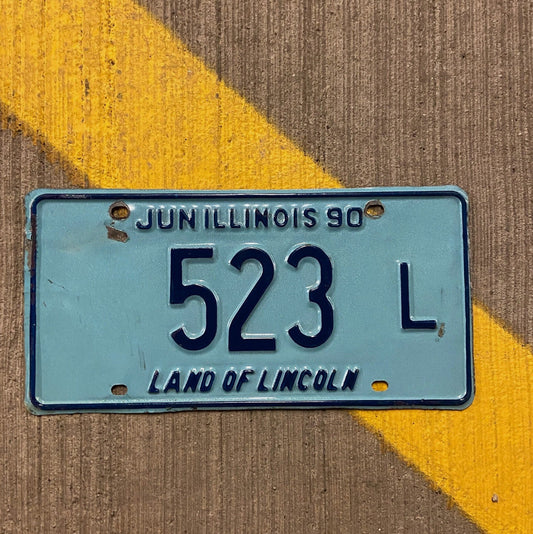 Photo of a 1990 Illinois Truck License Plate Auto Tag Garage Decor Vintage 523 L with original patina
