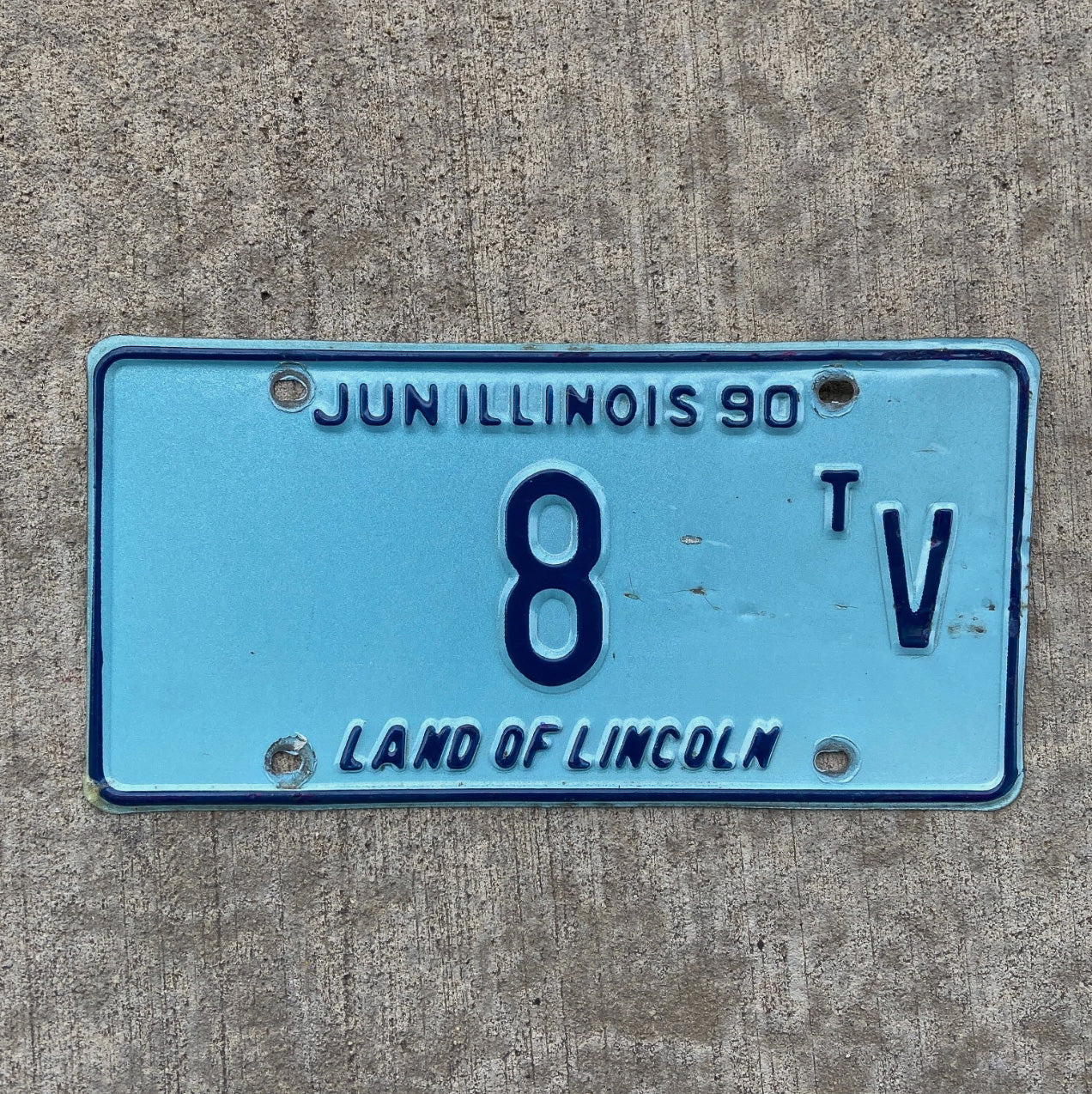 Photo of a 1990 Illinois Truck Tractor License Plate Auto Tag Garage Decor Vintage Low Number Single Digit 8 TV with original patina