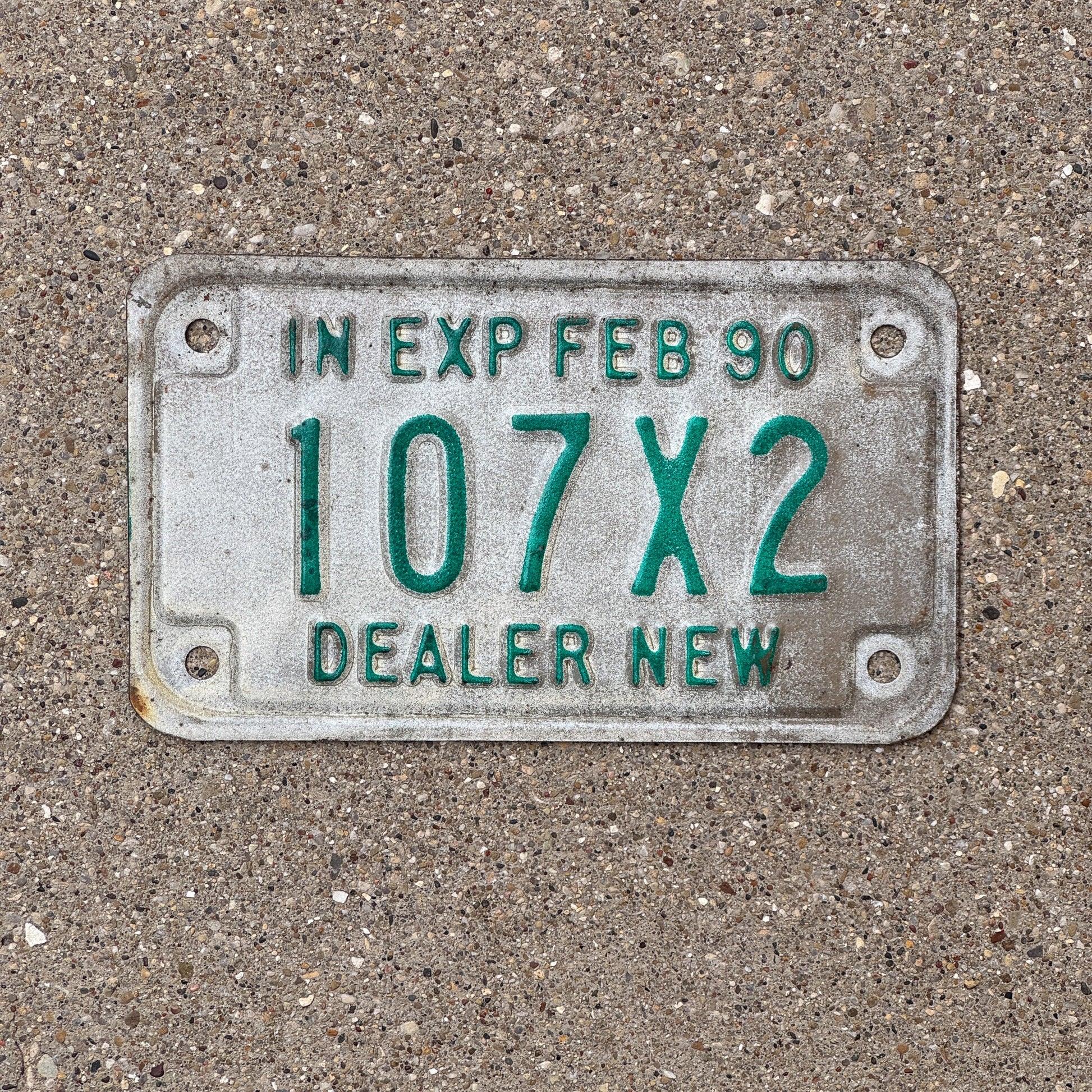 Photo of a 1990 Indiana Motorcycle Dealer License Plate Auto Tag Garage Decor Vintage 107 X 2 with original patina