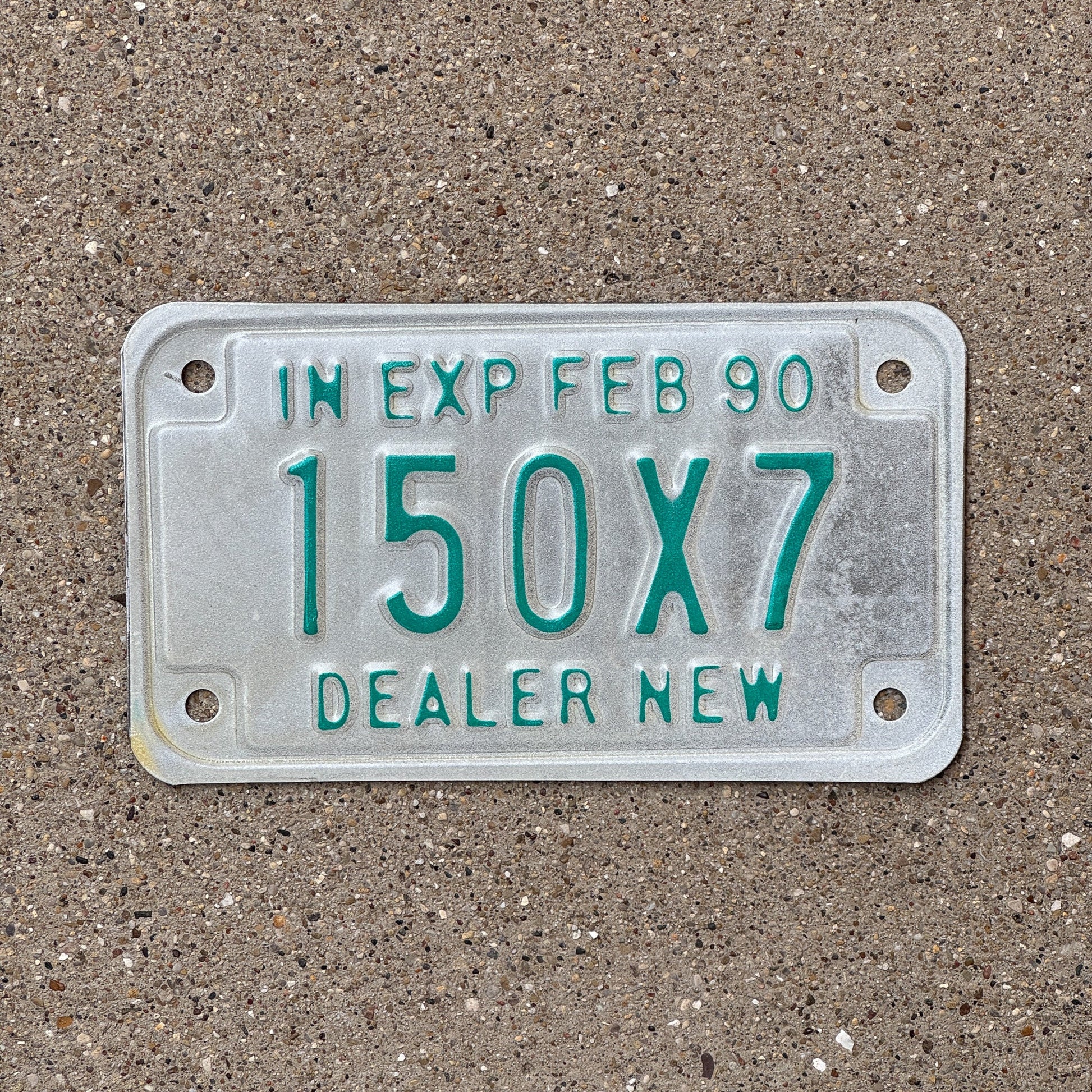 Photo of a 1990 Indiana Motorcycle Dealer License Plate Auto Tag Garage Decor Vintage 150 X 7 with original patina