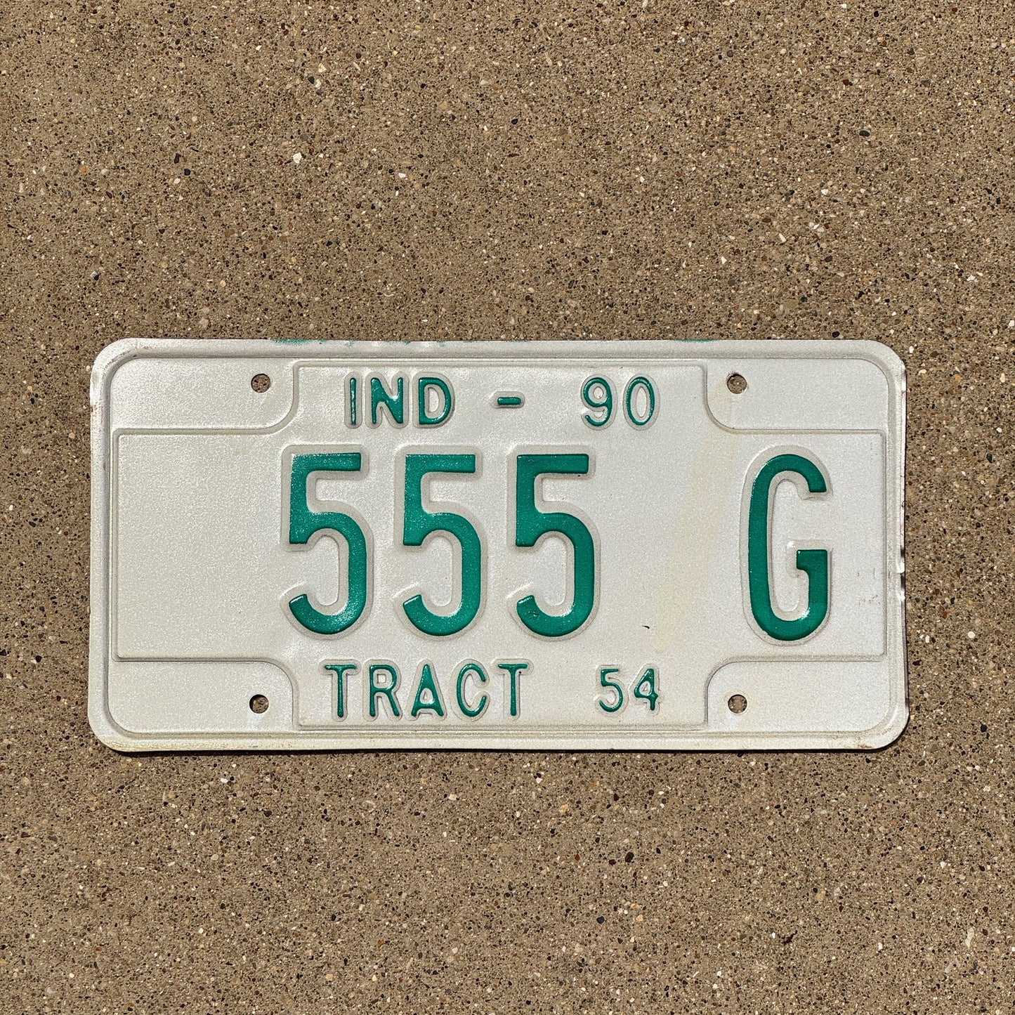 Photo of a 1990 Indiana Tractor License Plate Auto Tag Garage Decor Vintage 555 G