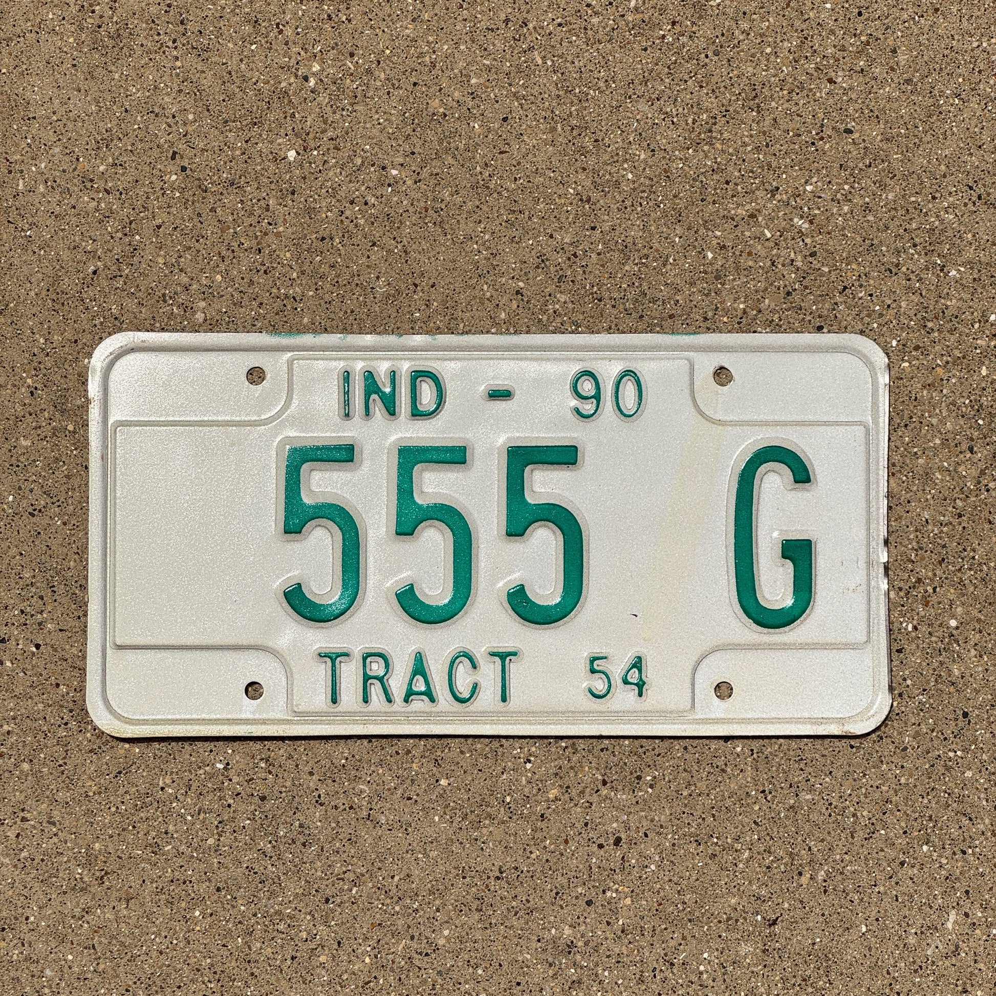 Photo of a 1990 Indiana Tractor License Plate Auto Tag Garage Decor Vintage 555 G