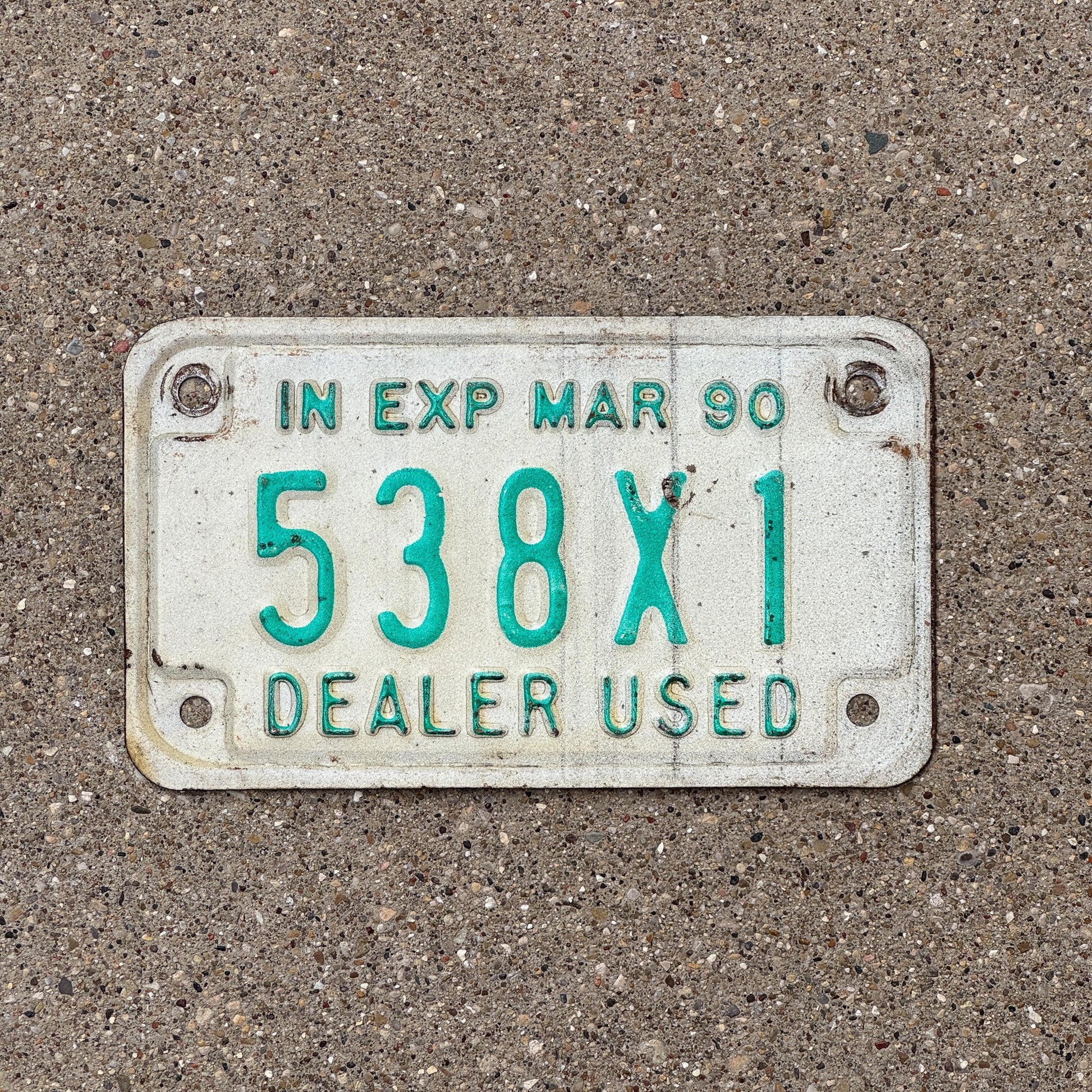 Photo of a 1990 Indiana Used Motorcycle Dealer License Plate Auto Tag Garage Decor Vintage 538 X 1 with original patina