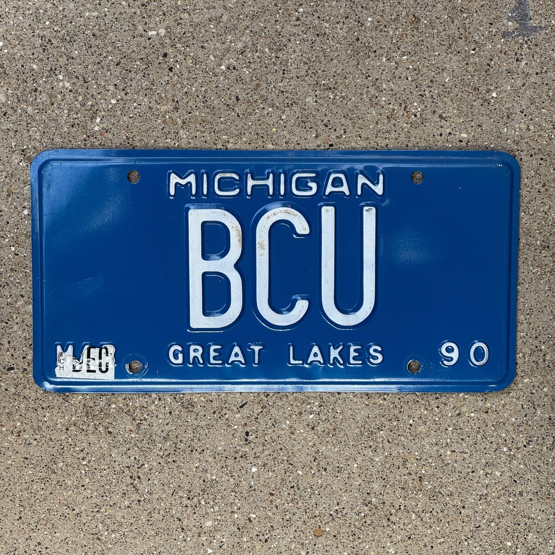 Photo of a 1990 Michigan Vanity License Plate Auto Tag Garage Decor Vintage BCU