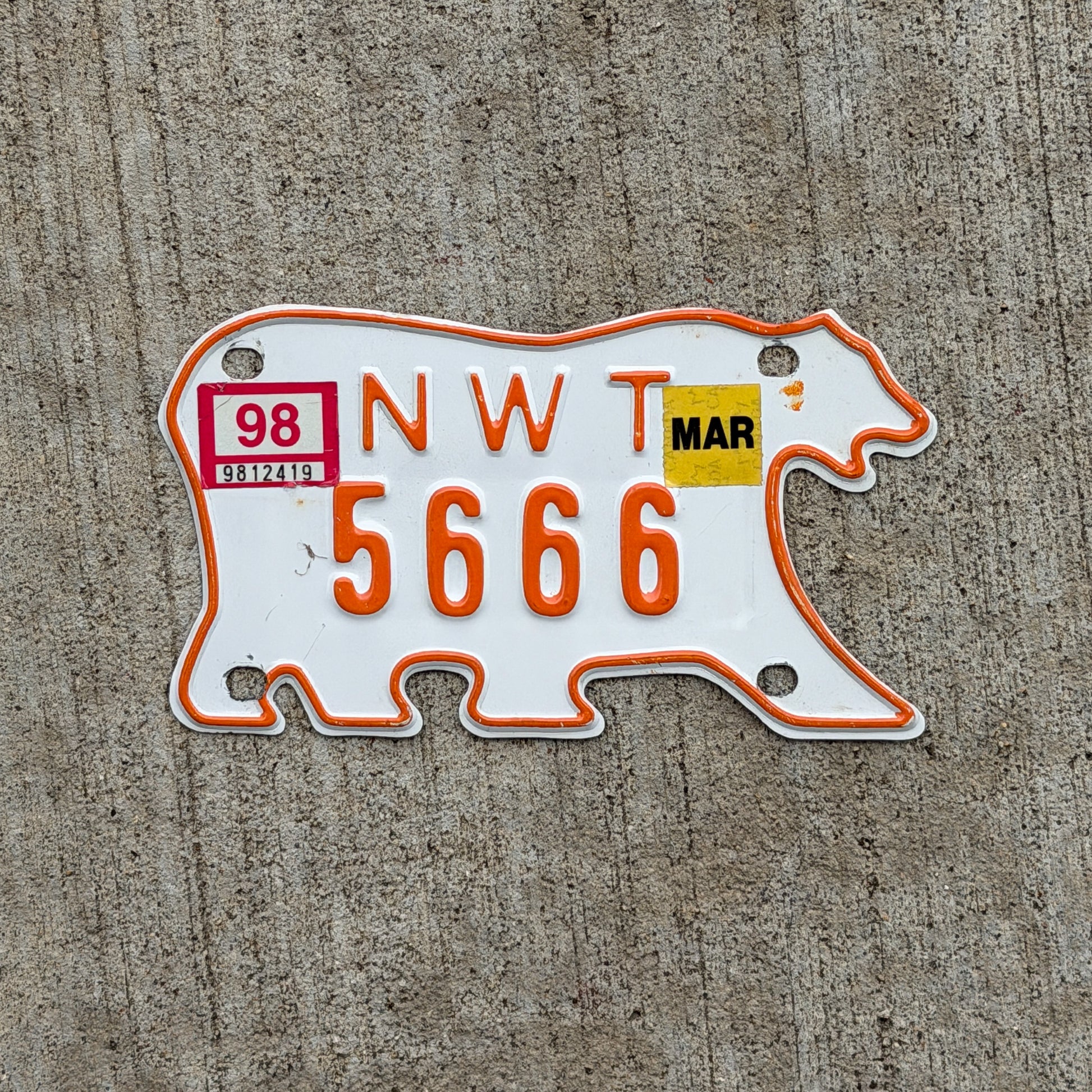 Photo of a 1990 Northwest Territories ATV License Plate Auto Tag Garage Decor Vintage Polar Bear 666 Devil Evil Repeat Repeating 5666 with original patina