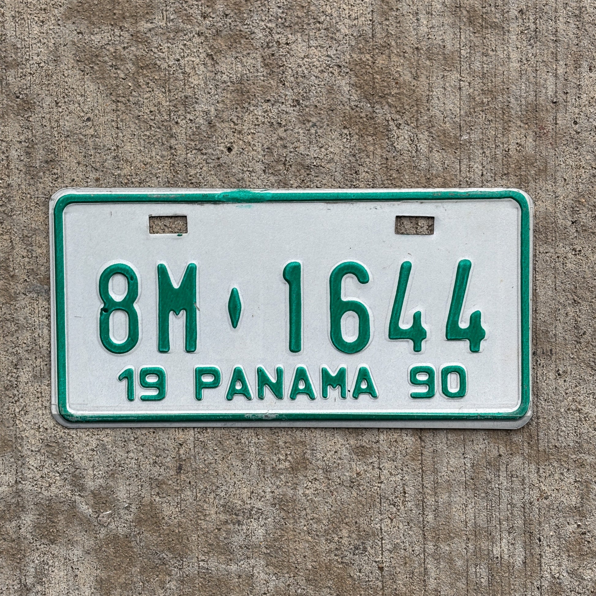 Photo of a 1990 Panama Motorcycle License Plate Auto Tag Garage Decor Vintage 8M 1644 with original patina