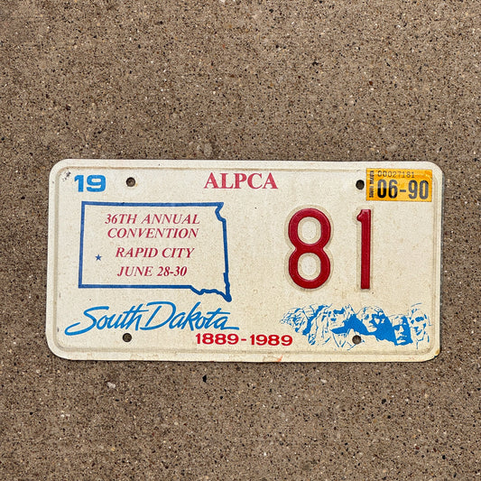Photo of a 1990 South Dakota License Plate Auto Tag Garage Decor Vintage Rapid City ALPCA Convention 81