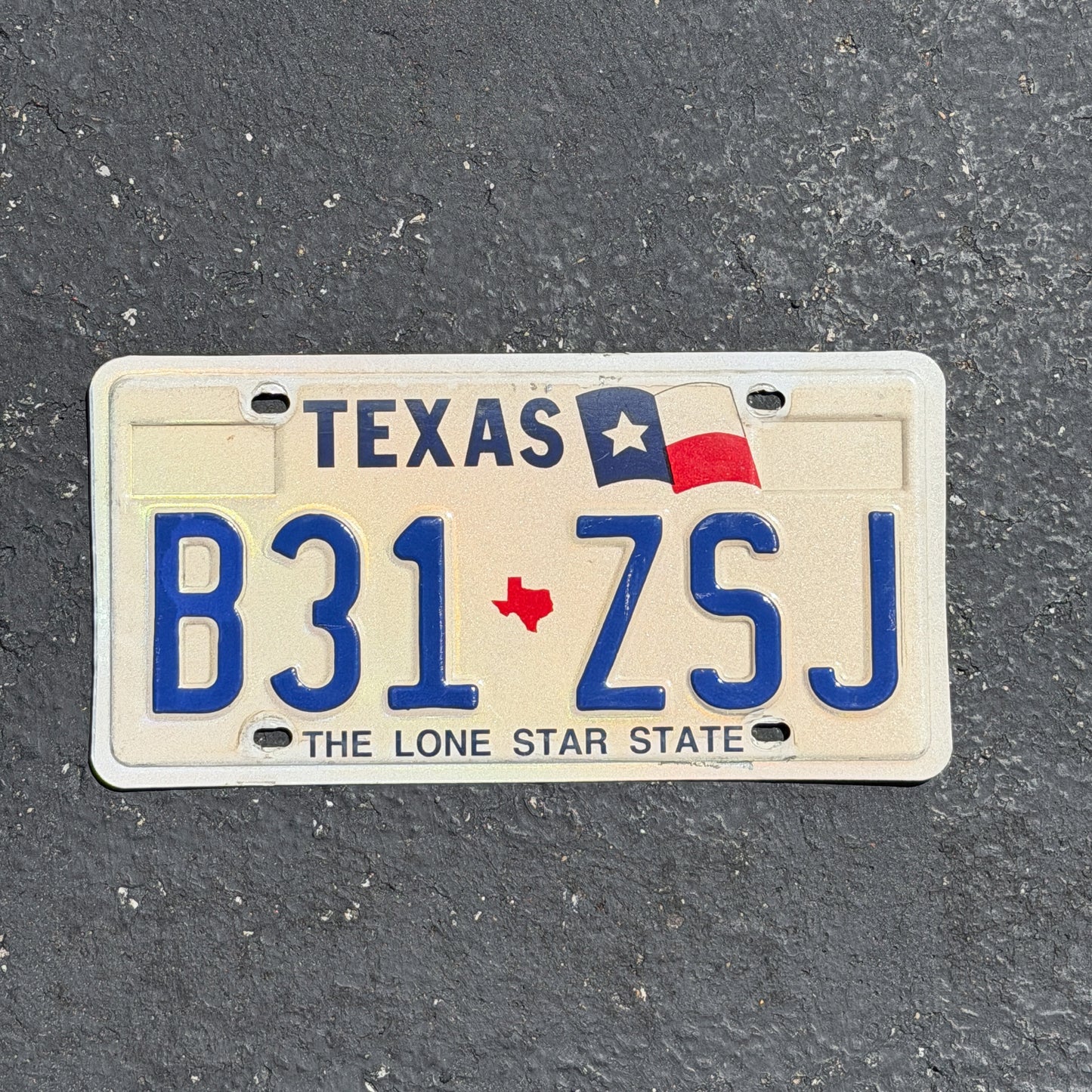Photo of a 1990 Texas License Plate Auto Tag Garage Decor Vintage B31 ZSJ with original patina