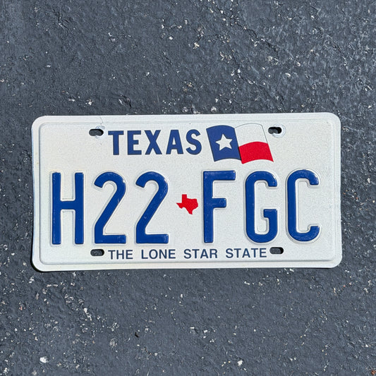 Photo of a 1990 Texas License Plate Auto Tag Garage Decor Vintage H22 FGC with original patina