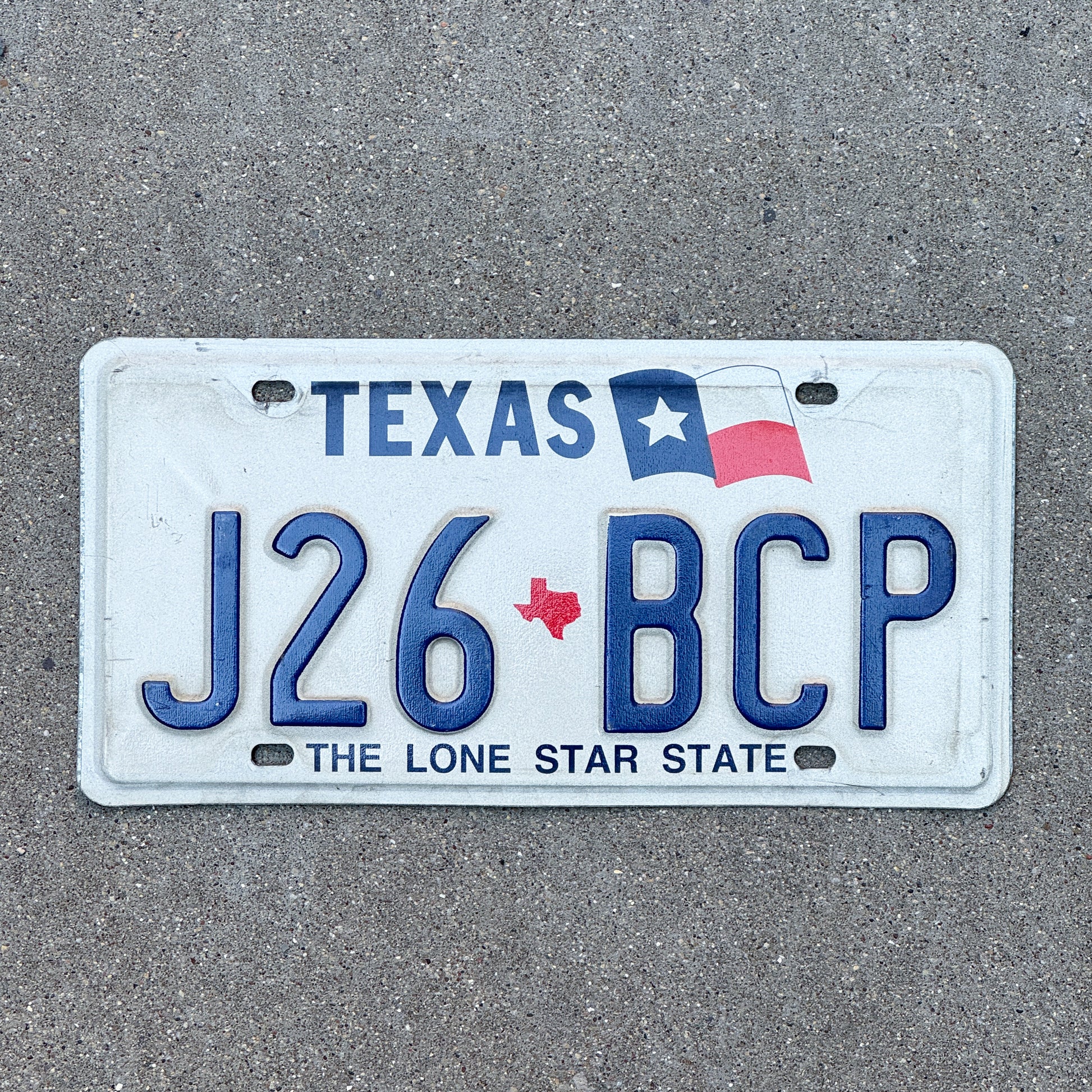 Photo of a 1990 Texas License Plate Auto Tag Garage Decor Vintage J26 BCP with original patina