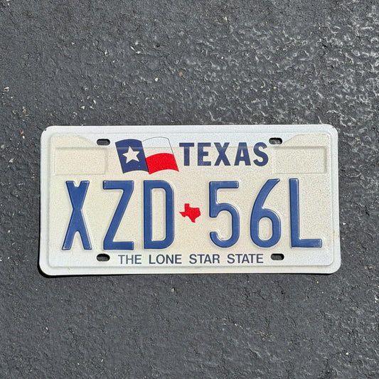Photo of a 1990 Texas License Plate Auto Tag Garage Decor Vintage XZD 56L with original patina