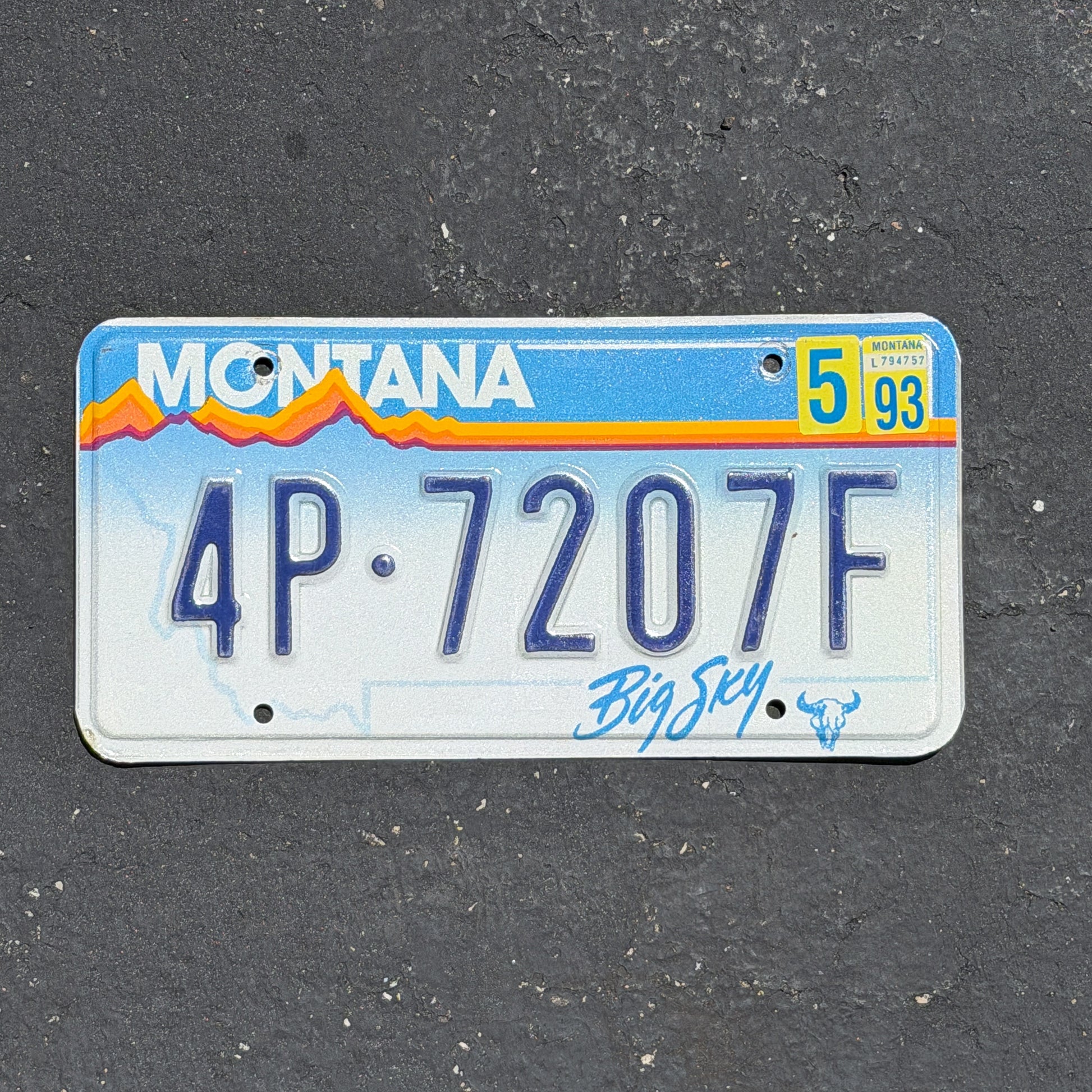 Photo of a 1991 1993 Montana License Plate Auto Tag Garage Decor Vintage 4P 7207F with original patina