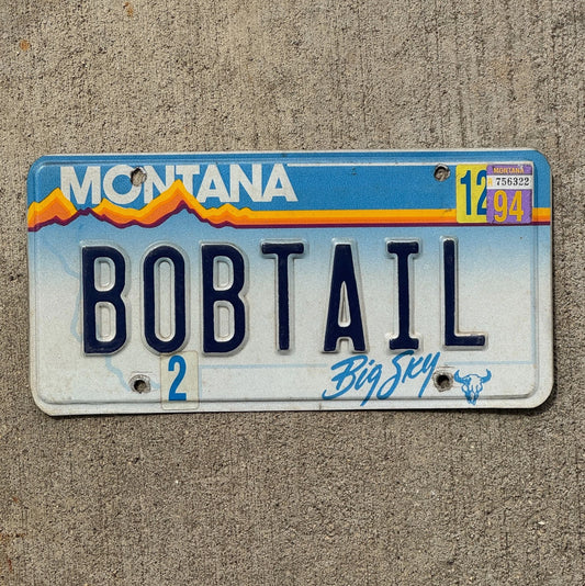 Photo of a 1991 1994 Montana Vanity Truck License Plate Auto Tag Garage Decor Vintage BOBTAIL with original patina