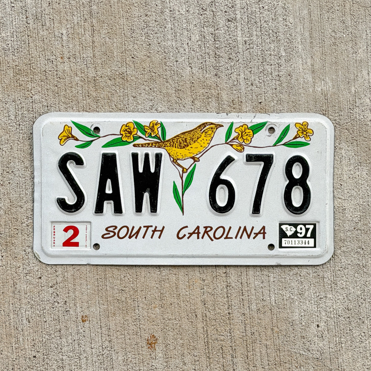 Photo of a 1991 1997 South Carolina License Plate Auto Tag Garage Decor Vintage SAW 678 with original patina
