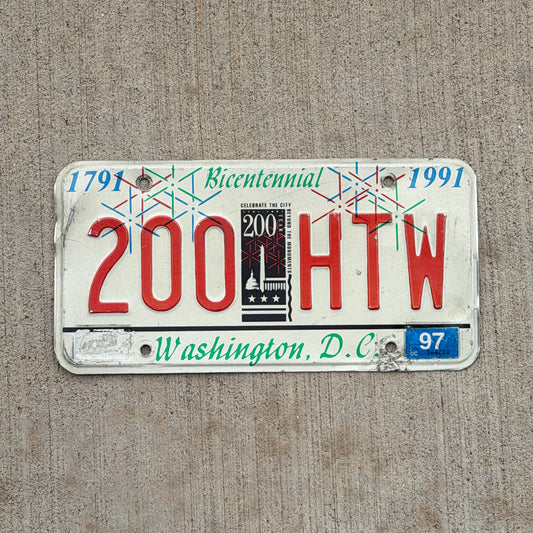 Photo of a 1991 1997 Washington DC License Plate Auto Tag 2 Vintage Garage DC Bicentennial 200 HTW with original patina