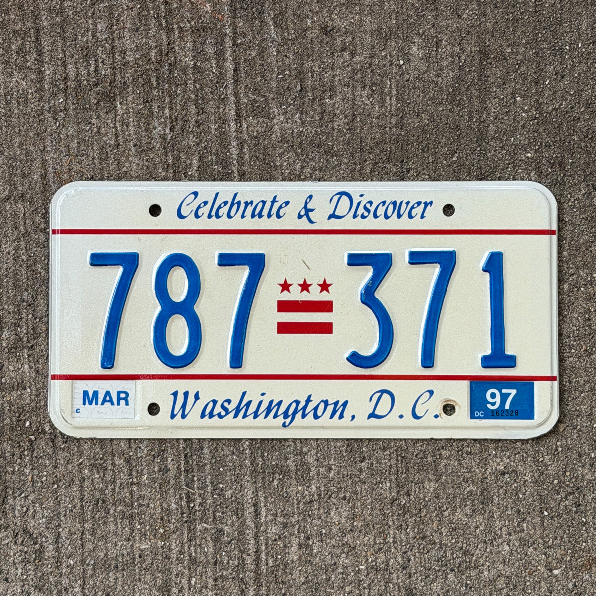 Photo of a 1991 1997 Washington DC License Plate Auto Tag Garage Decor Vintage Celebrate & Discover 787 371 with original patina
