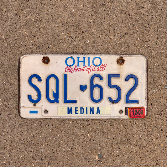 Photo of a 1991 2000 Ohio License Plate Auto Tag 1 Vintage Garage SQL 652 with original patina