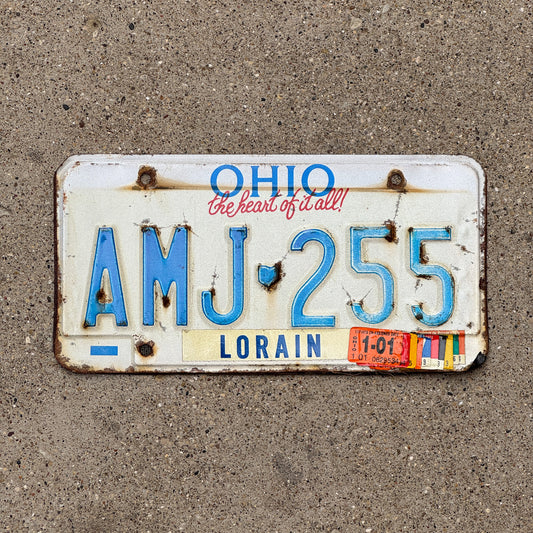 Photo of a 1991 2001 Ohio License Plate Auto Tag 2 Vintage Garage AMJ 255 with original patina