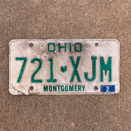 Photo of a 1991 2002 Ohio License Plate Auto Tag Garage Decor Vintage 721 XJM with original patina