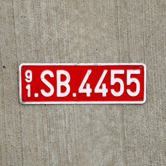 Photo of a 1991 Belgium SHAPE Brigade License Plate Auto Tag 1 Vintage NATO Supreme Headquarters Allied Powers Europe SB 4455 with original patina