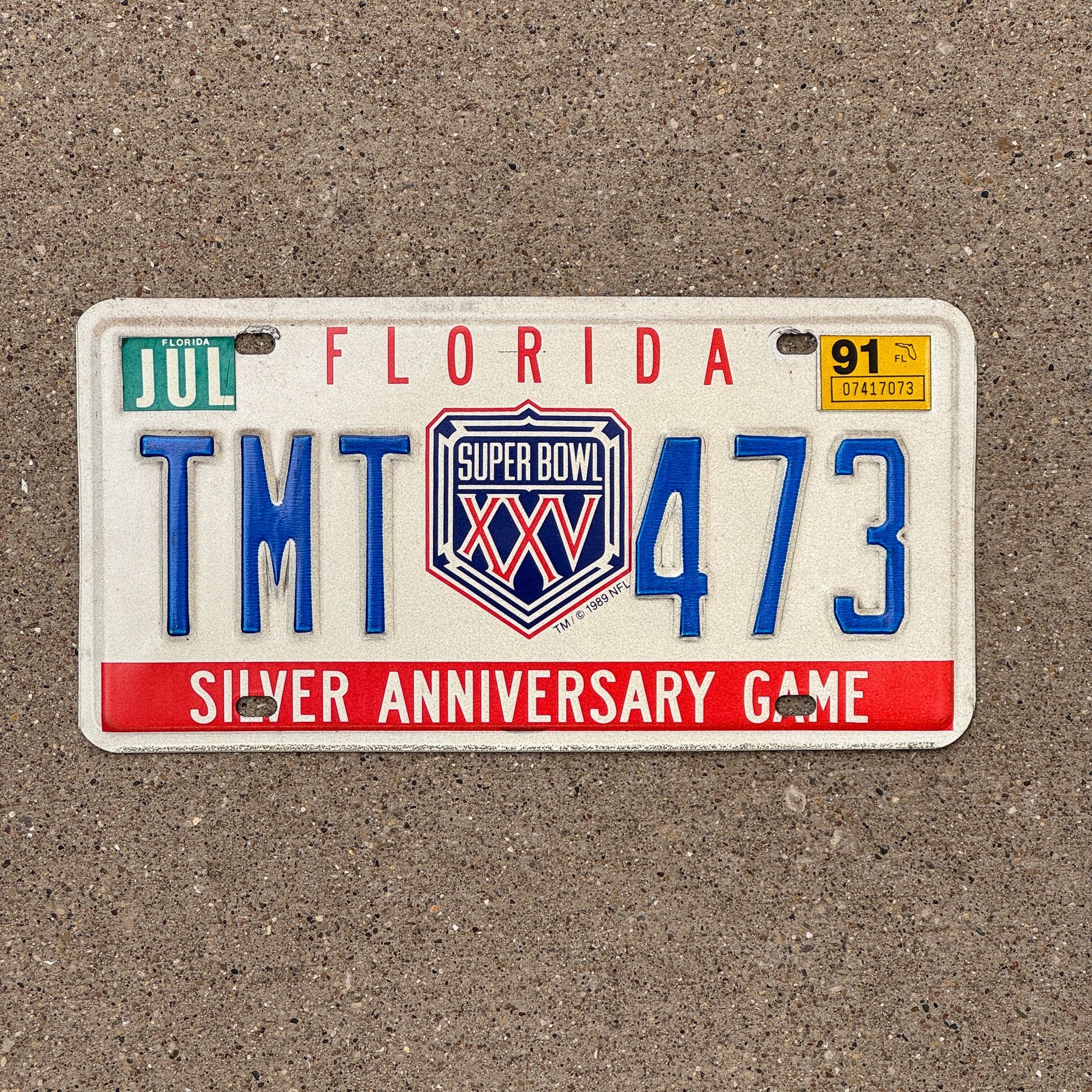 Photo of a 1991 Florida Graphic / Specialty License Plate Auto Tag Garage Decor Vintage Super Bowl XXV NFL Football TMT 473