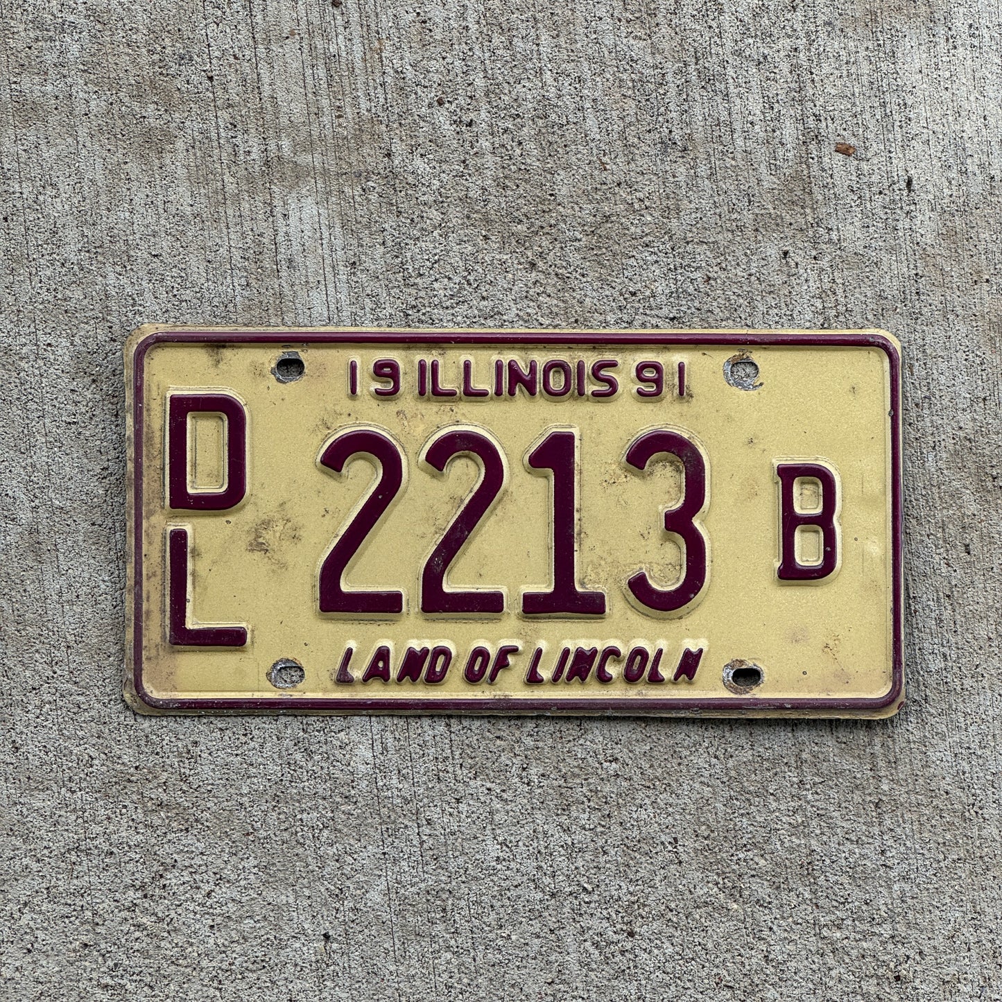 Photo of a 1991 Illinois Dealer License Plate Auto Tag 1 Vintage Garage 2213 B with original patina