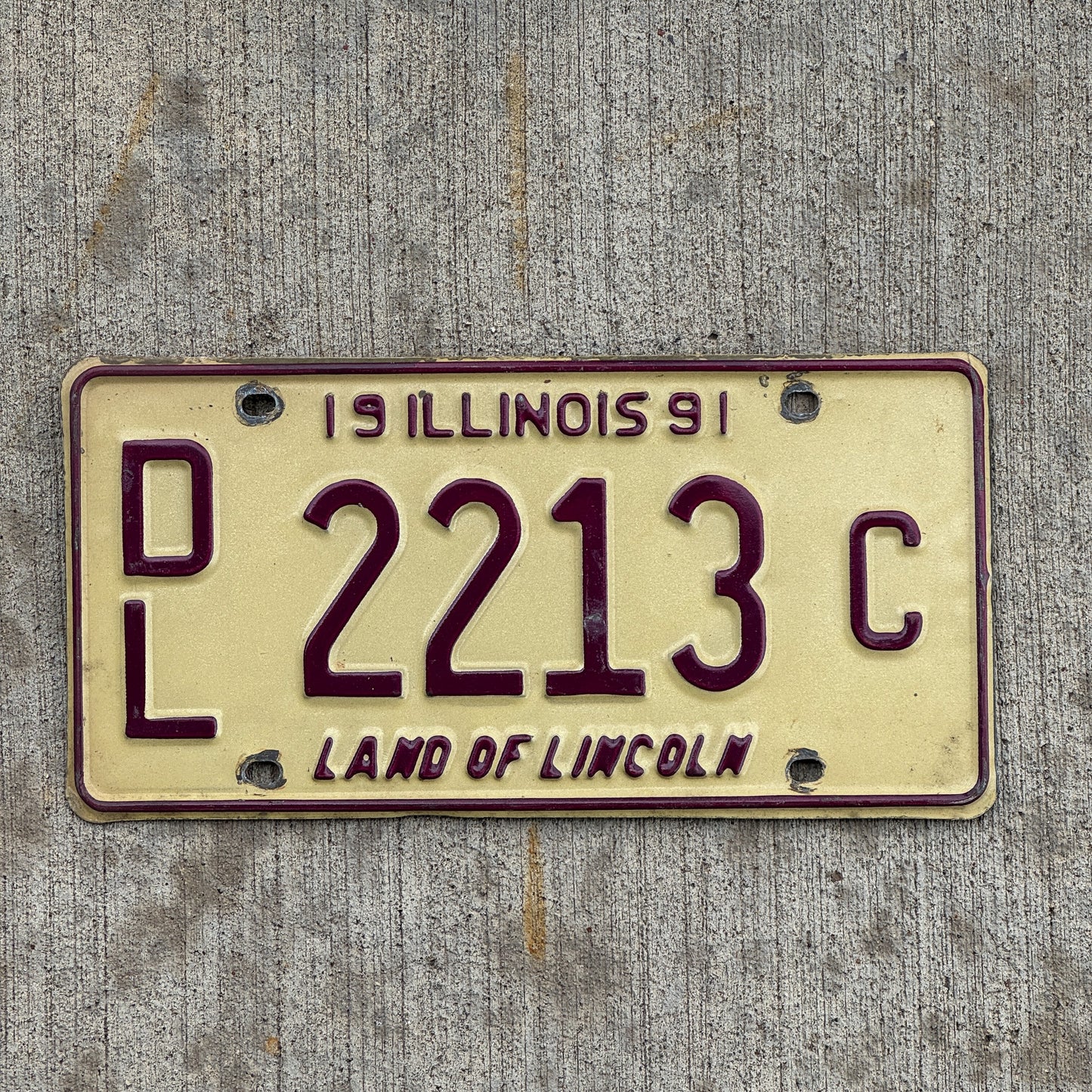 Photo of a 1991 Illinois Dealer License Plate Auto Tag 1 Vintage Garage 2213 C with original patina