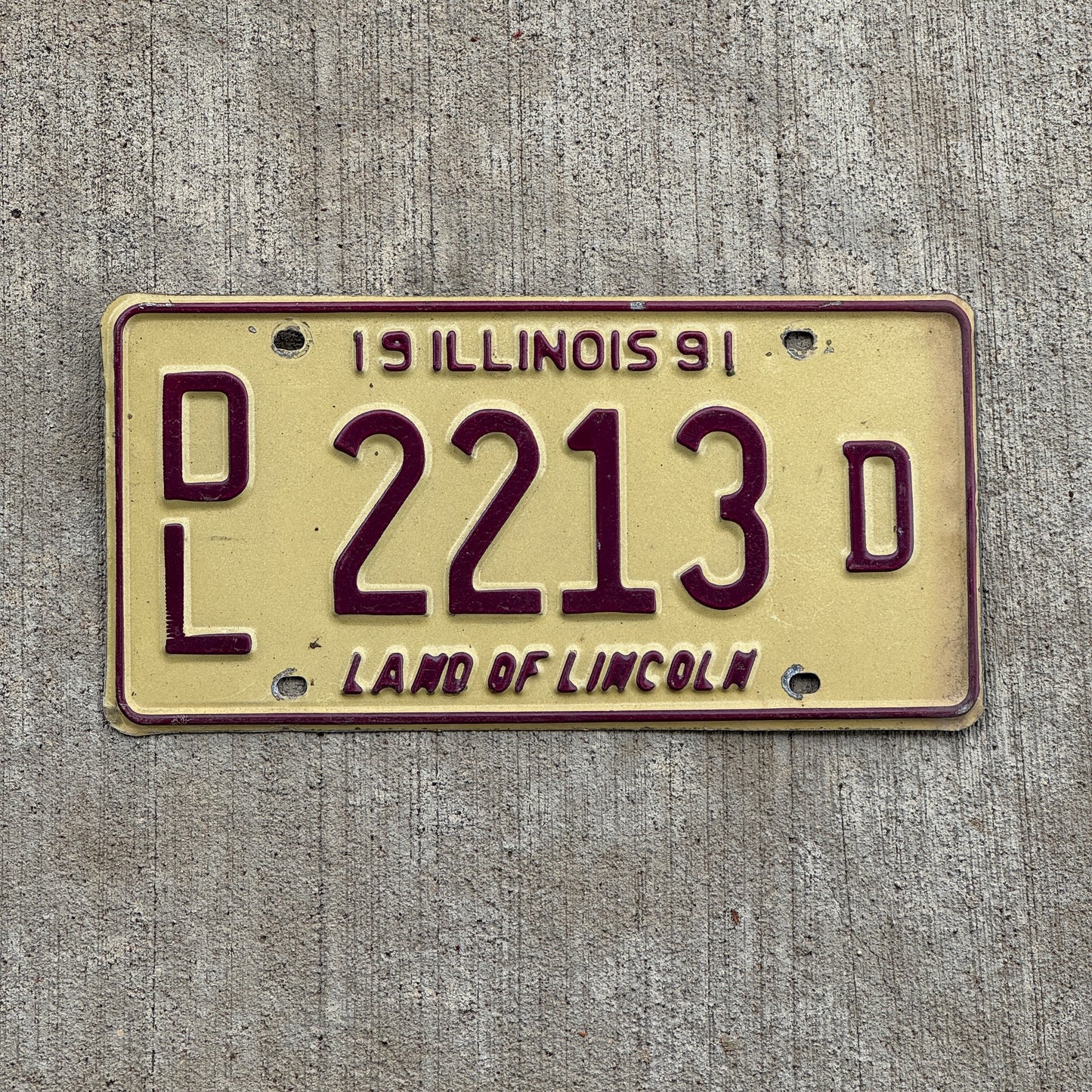 Photo of a 1991 Illinois Dealer License Plate Auto Tag 1 Vintage Garage 2213 D with original patina