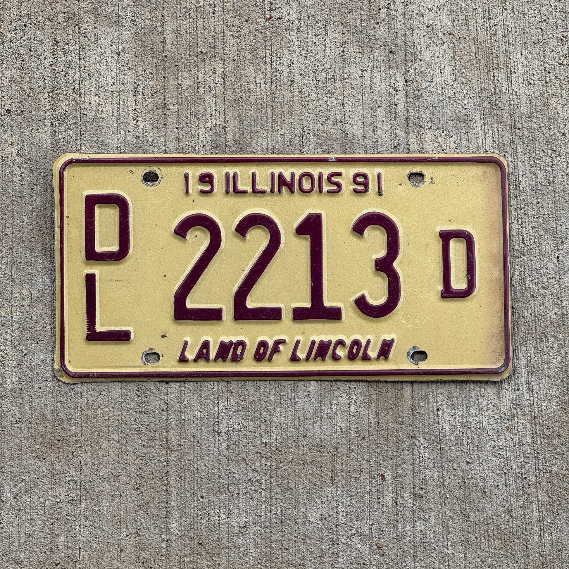 Photo of a 1991 Illinois Dealer License Plate Auto Tag 1 Vintage Garage 2213 D with original patina