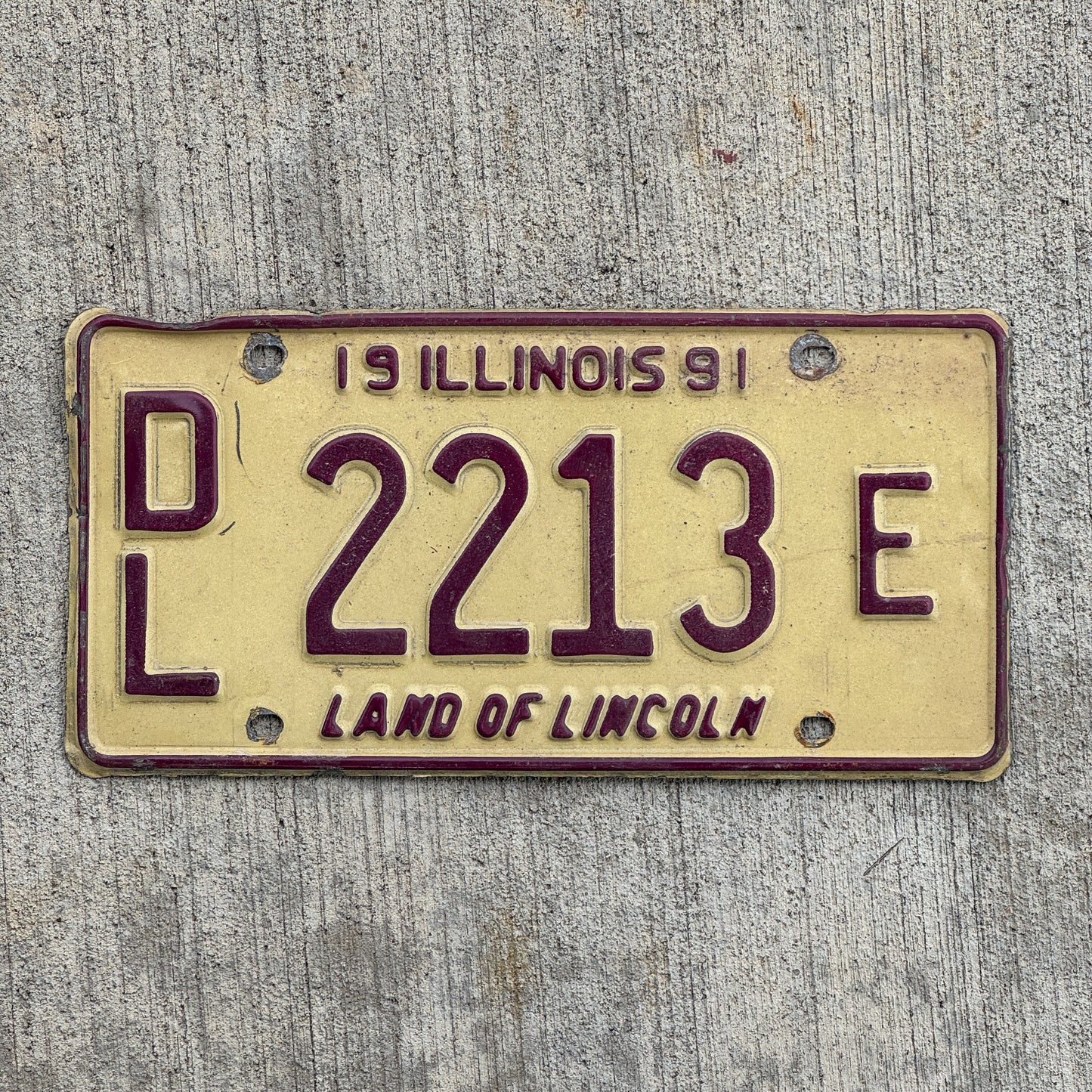 Photo of a 1991 Illinois Dealer License Plate Auto Tag 1 Vintage Garage 2213 E with original patina